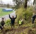 Students and Coaches Help Restore Area at Duniway Track